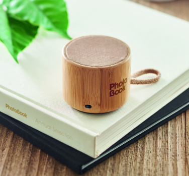 Logo trade corporate gifts image of: Round bamboo wireless speaker