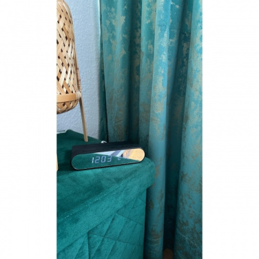 Logo trade reklaamkingid foto: Äratuskell ja juhtmevaba laadija ADELAIDE